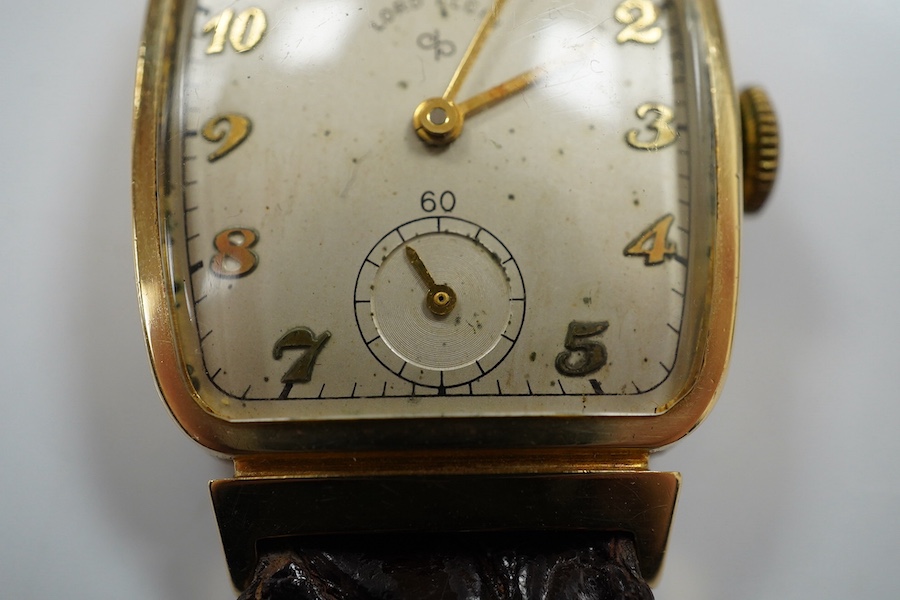 A gentleman's 14k Lord Elgin manual wind wrist watch, with Arabic dial and subsidiary seconds, case diameter 25mm, on an associated leather strap. Condition - poor